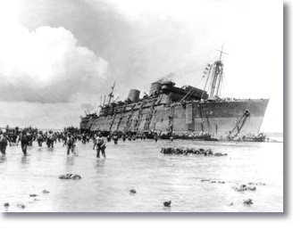 Troops safely walking away from SS President Coolidge after run onto the shore